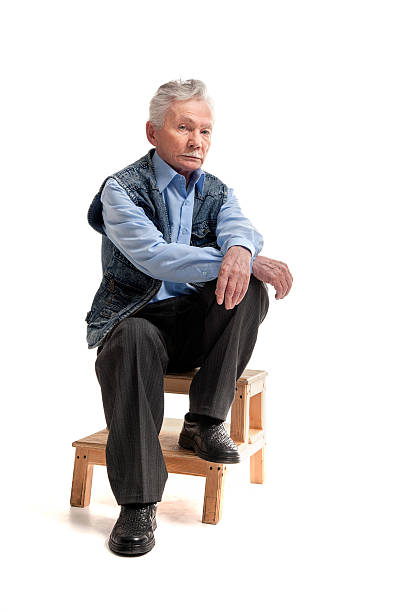 istock Man in a hat sitting with a gun 501023927