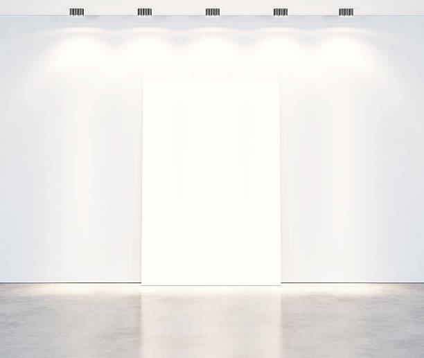 istock White room with lamps and blank poster 501026857