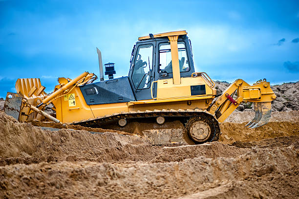 istock bulldozer or excavator working with soil on construction site of 501026893