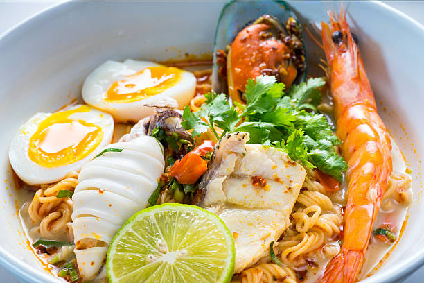 Here is a Spicy Seafoods Tom Yam noodle in Thai style. All fresh materials add to this bowl and mix with spicy tom yam hot soup. Try one if you come to Thailand.
