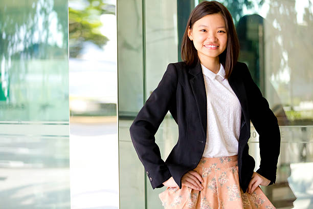 istock Young female Asian business executive smiling portrait 501036800