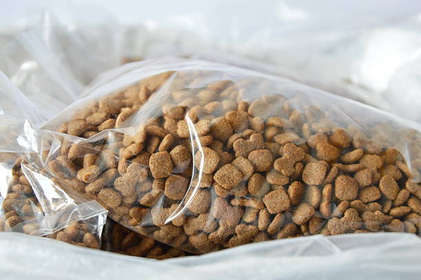 dog food plastic bag packing for sale in pet shop stock photo