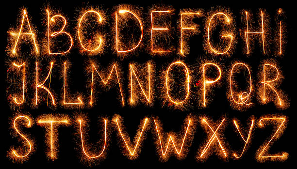 istock Alphabet made of sparklers isolated on black 501039708