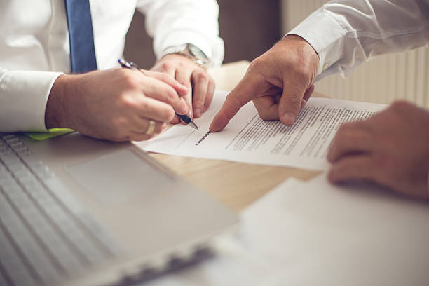 Business man signing a contract