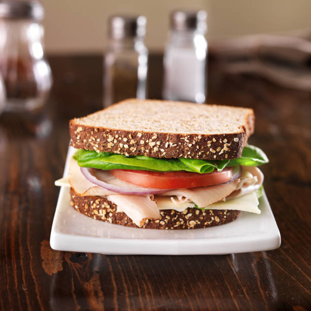 istock deli meat sandwich, with turkey and toppings 501040873
