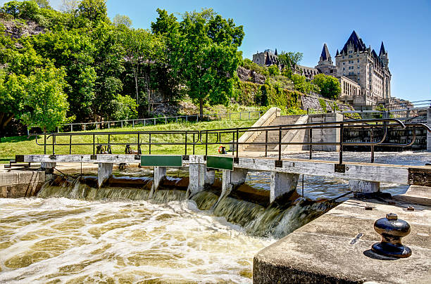 Ottawa, Canada September 18, 2018: Cview of the famous Rideau Canal and one of its water locks near the Ottawa River, and famous Chateau Laurier, resembling a giant castle.