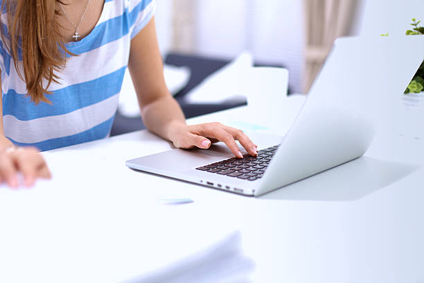 istock Woman with documents sitting on the desk 501057296