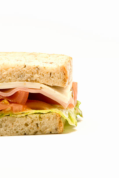 istock Sandwich of cheese, ham, tomato and lettuce 501057347