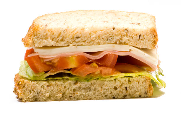 istock Sandwich of cheese, ham, tomato and lettuce 501057773