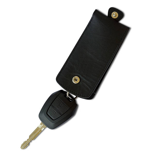 istock Black car Key and Keychain on white background 501057779