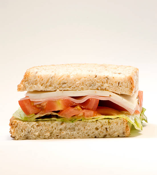 istock Sandwich of cheese, ham, tomato and lettuce 501059529