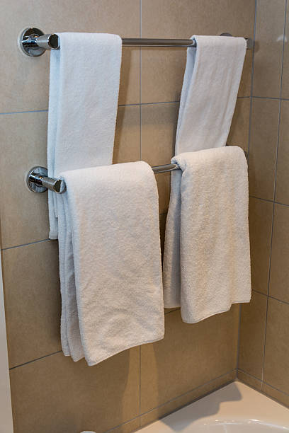 istock white towels on a hanger prepared to use 501059900