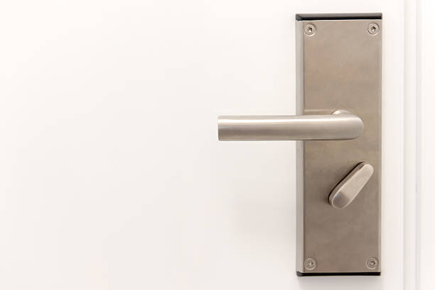 istock door metal handle on the white door 501060406