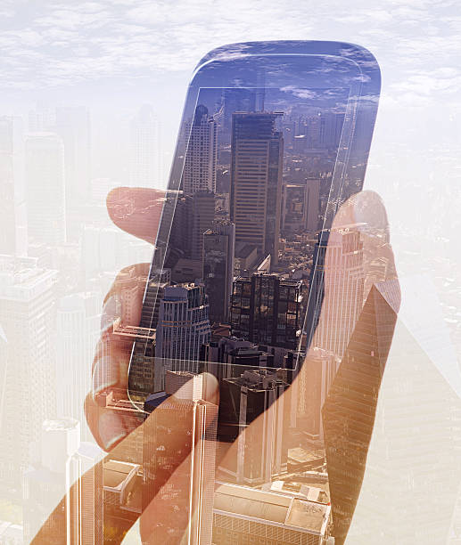 istock Double exposure of cityscape and smart phone 501060423