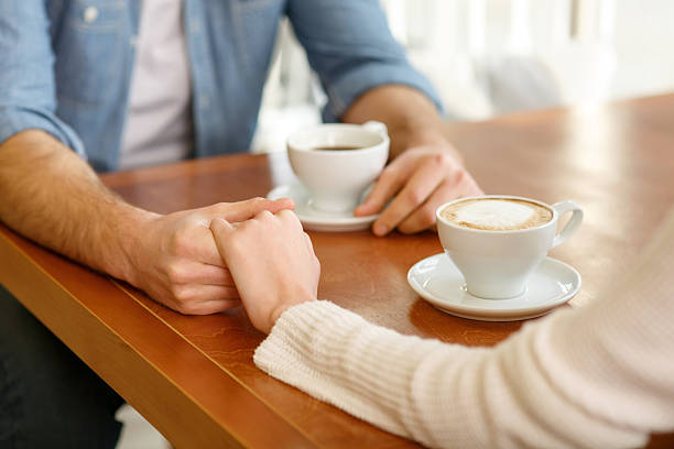 istock Loving couple sitting in the cafe 501060622