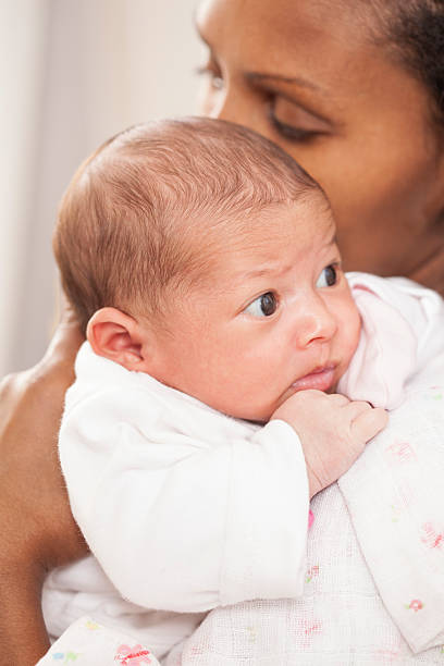 istock Newborn in mother's arms. 501061386