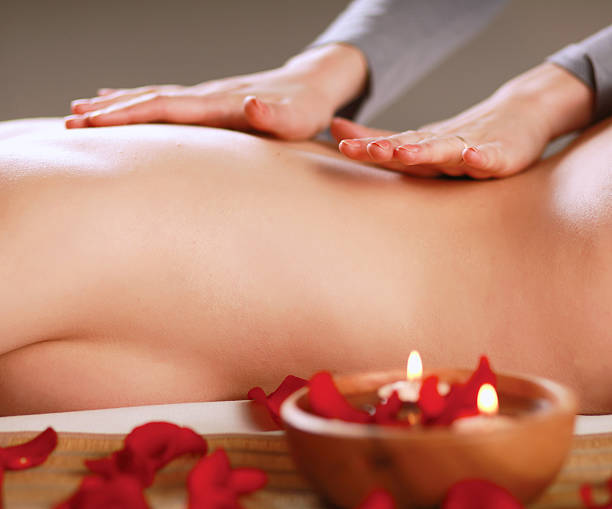 istock Beautiful young woman getting spa massage 501062318