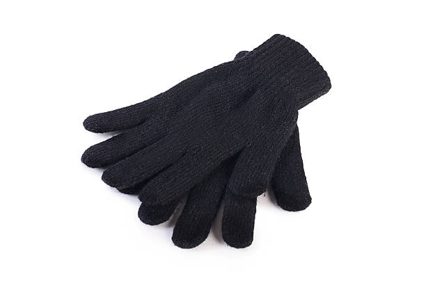 istock Black woolen gloves isolated on white 501062370