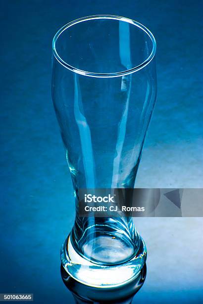 Empty Glass On A Reflective Surface Stock Photo - Download Image Now - Alcohol - Drink, Beer - Alcohol, Beer Glass