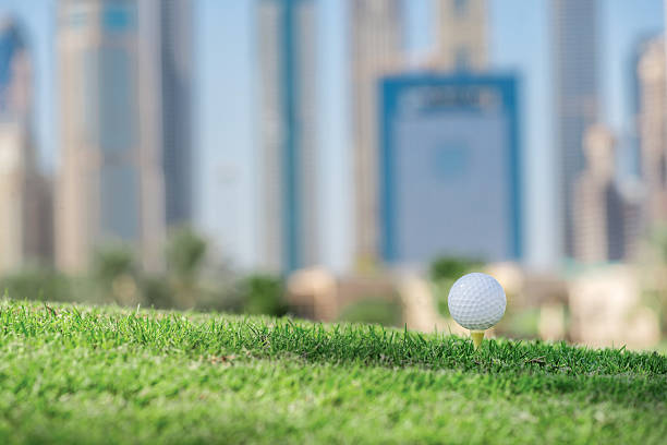 istock The golf day. Golf ball is on the tee 501064016