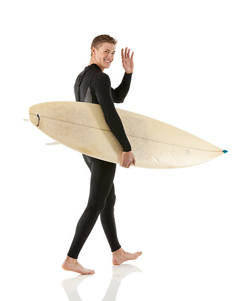 istock Man wearing wetsuit & waving hand 501064229