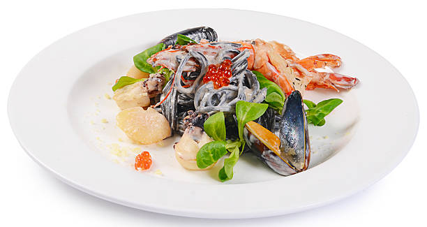 istock The black spaghetti with seafood closeup 501064244