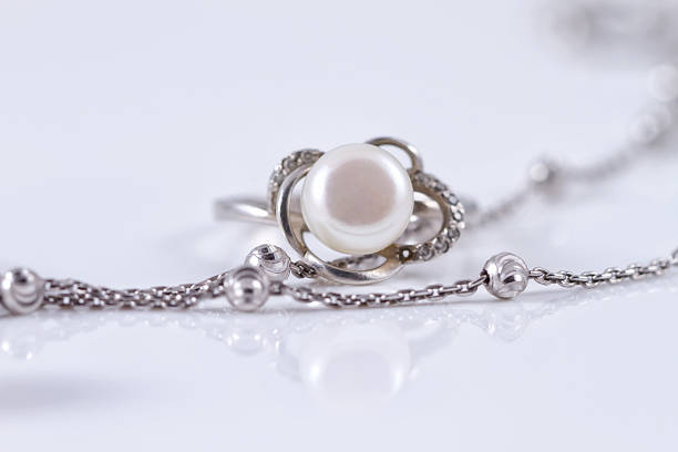 istock Unusual beautiful silver chain and a silver ring with pearl 501064252