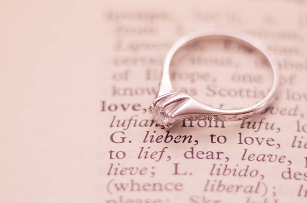 istock Diamond ring together with definition of love. 501067094