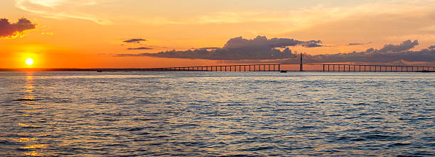 Sunset and Manaus Iranduba Bridge over the Amazon, Brazil