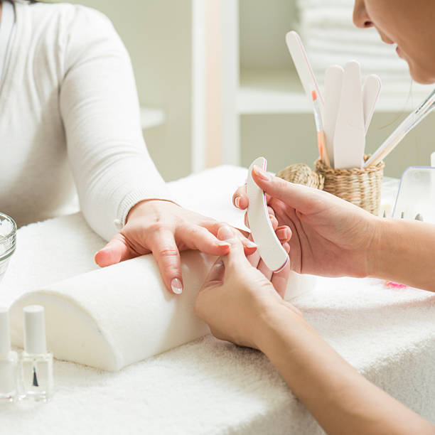 istock Brushing the nail for manicure 501067998