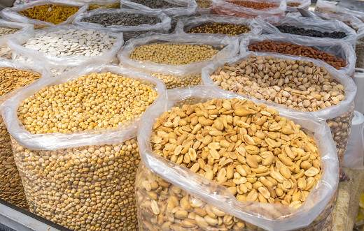 Varieties of nuts: peanuts, hazelnuts, chestnuts, walnuts, pistachio and pecans. Food and cuisine.