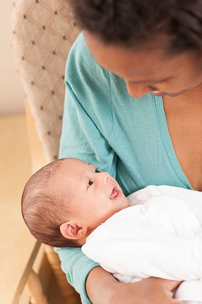 istock Smiling baby in mother׳s arms. 501069742