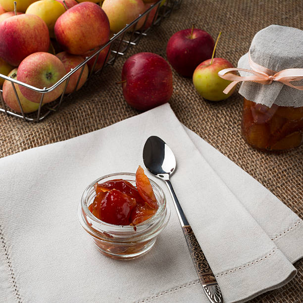 istock jars of apple jam with fresh fruits 501070248