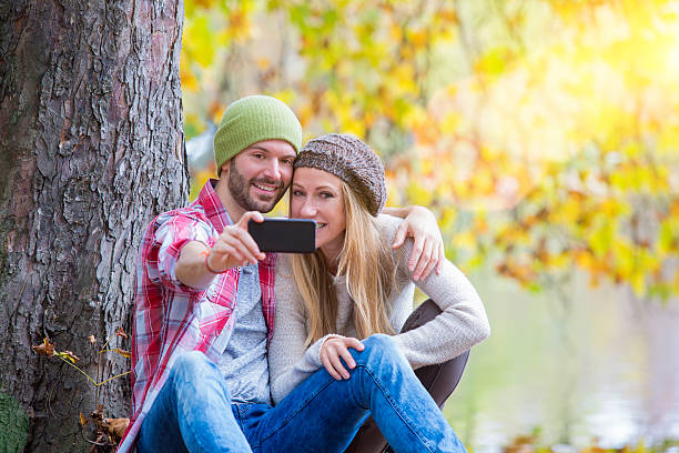 istock Young couple dating in park 501071322