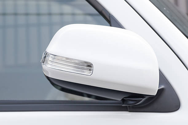 istock Side rear-view mirror closed for safety at car park 501072814