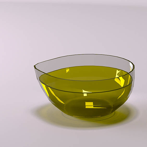 Glass Cup with fresh olive oil.