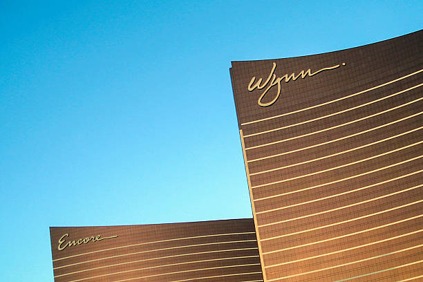 Wynn Hotel Las Vegas Las Vegas, USA - December 14, 2008: Wynn Las Vegas is a five star luxury resort and casino located on the Las Vegas Strip named after casino developer Steve Wynn. The 187 m high hotel has 49 floors with the 2716 rooms. The complex also includes a casino, convention center and shopping mall. Together with the adjacent Encore, the entire Wynn resort complex has a total of 4750 rooms, making it the world's sixth-largest hotel. wynn las vegas stock pictures, royalty-free photos & images