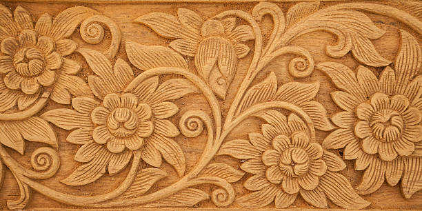istock flower carved on wood 501084470