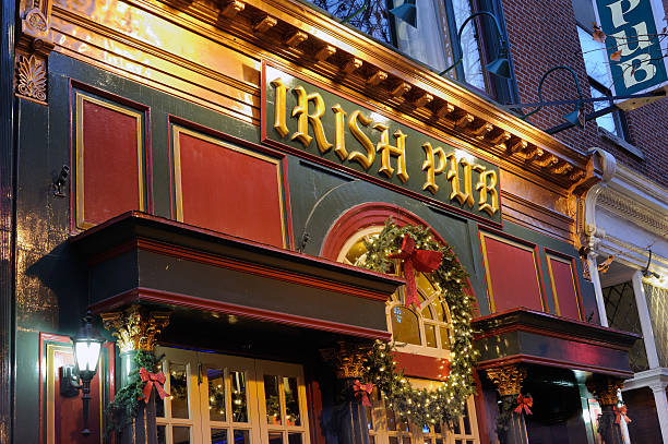 Philadelphia, USA - December 6, 2015. Facade of Irish Pub on Walnut Street in downtown Philadelphia. Philadelphia is the largest city in the state of Pennsylvania and the first city in the country selected as a World Heritage City. It has an important role in US history and attracts tourists from all over the world for landmarks like Independence Hall.
