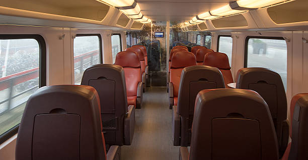 Empty dutch  intercity class train Empty First class cabin intercity train calling at main stations. train interior stock pictures, royalty-free photos & images