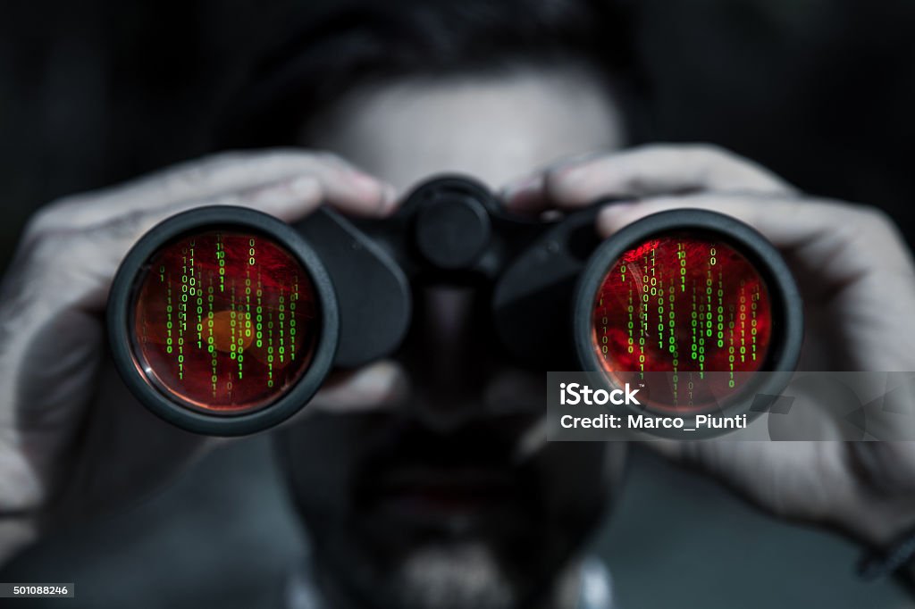 Hacker spy your data file Binoculars Stock Photo