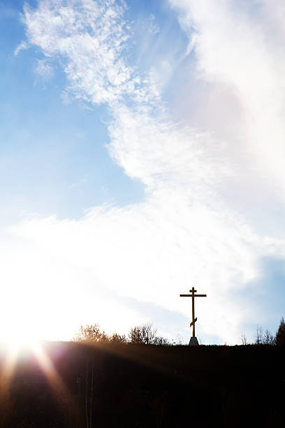 istock Christian cross on a hill against the sky 501091038
