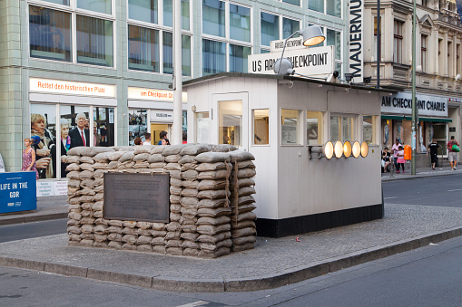 Berlin, Germany - August 7, 2015: Checkpoint Charlie in Berlin, Germany. It was the former border crossing between the West and East Berlin during the Cold War.