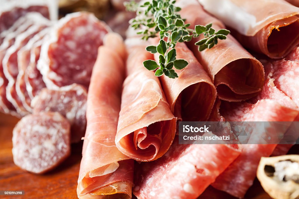 Cold cuts Cold cuts: charcuterie assortment on wooden board Charcuterie Stock Photo