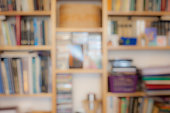 Blurred image of bookshelves with books