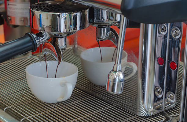istock Barista making a cup of coffee soft focus image . 501098300