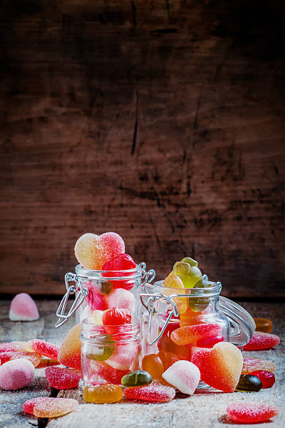 istock Bright multi-colored jelly candies in glass jar 501118636