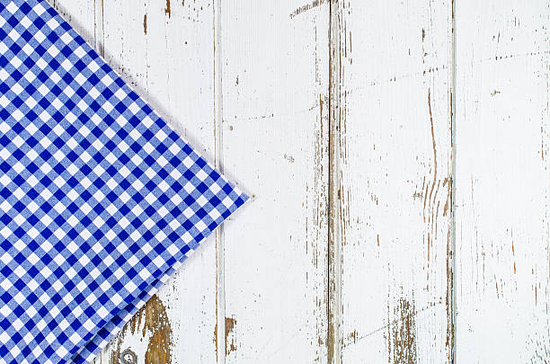 istock Blue tablecloth over wooden table 501118684