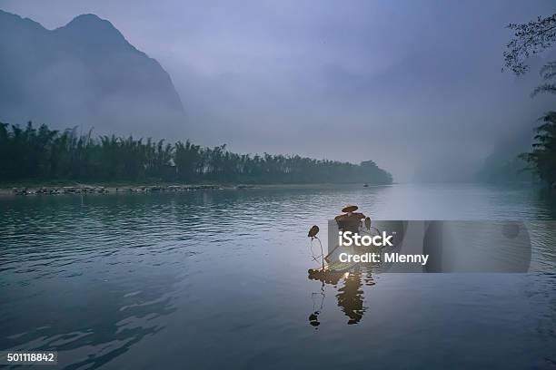 Li River Chinese Traditional Fisherman In Early Morning Fog Stock Photo - Download Image Now