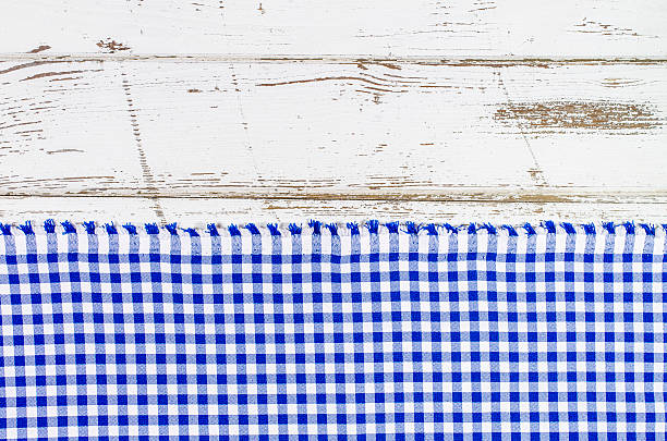 istock Blue tablecloth over wooden table 501118860